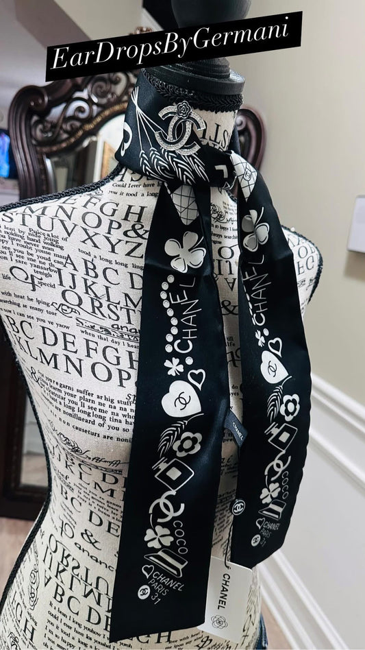 Elegant Black and White Scarf with brooch